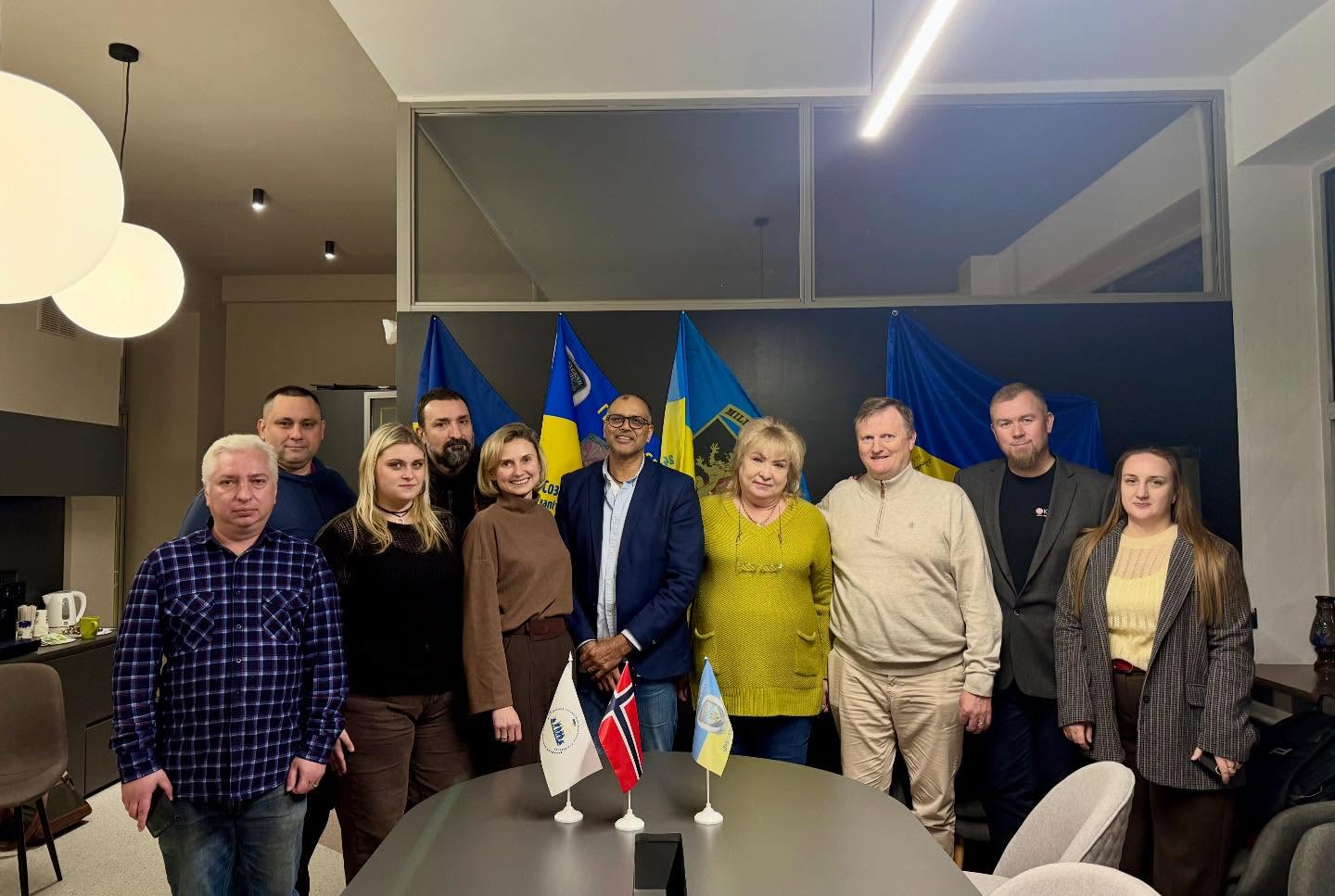 Joint meeting with Ukrainian partner organisation, Norwegian and Ukrainian flags on the table