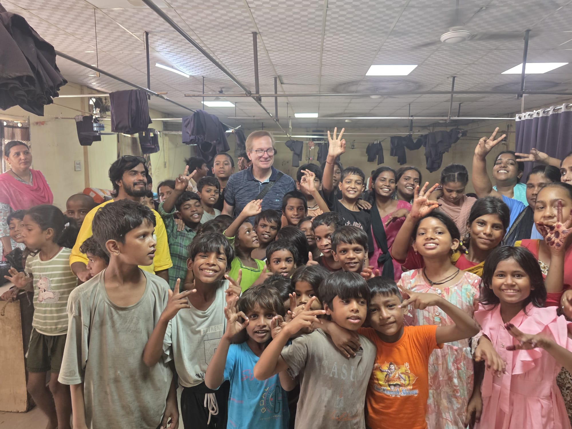 Children and staff at a community outreach centre in Delhi