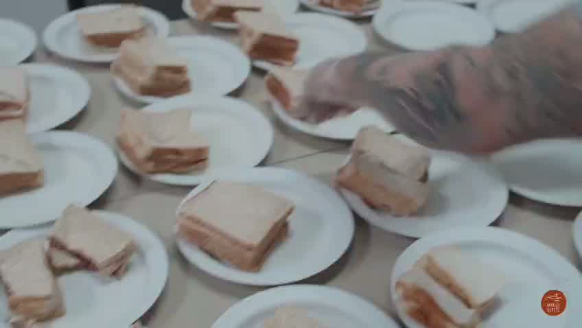Plates of freshly made sandwiches lined up in the Good Hope kitchen in Cape Town