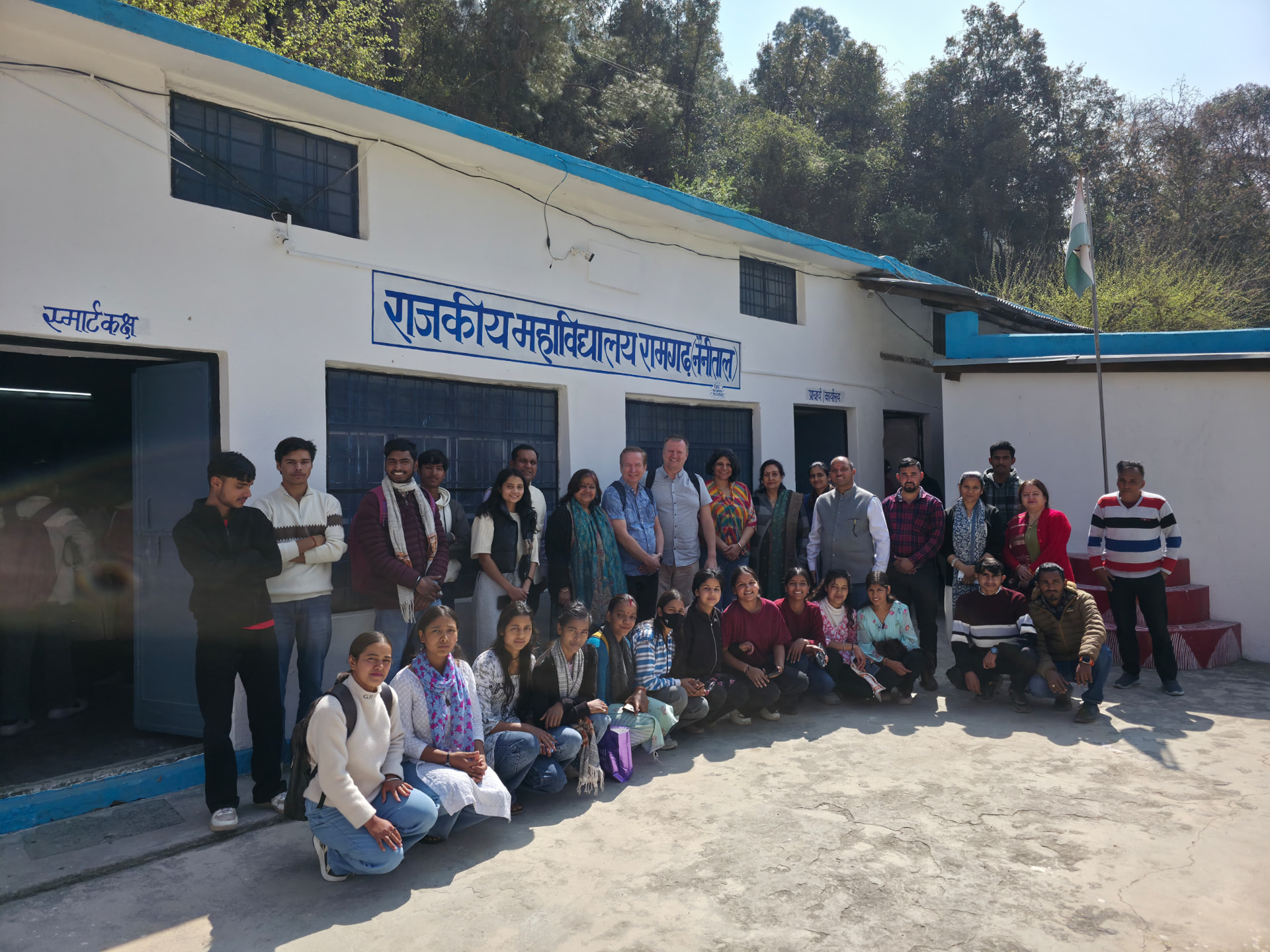 KBT staff and students gathered with faculty outside a government college building in Ramgarh, Nainital